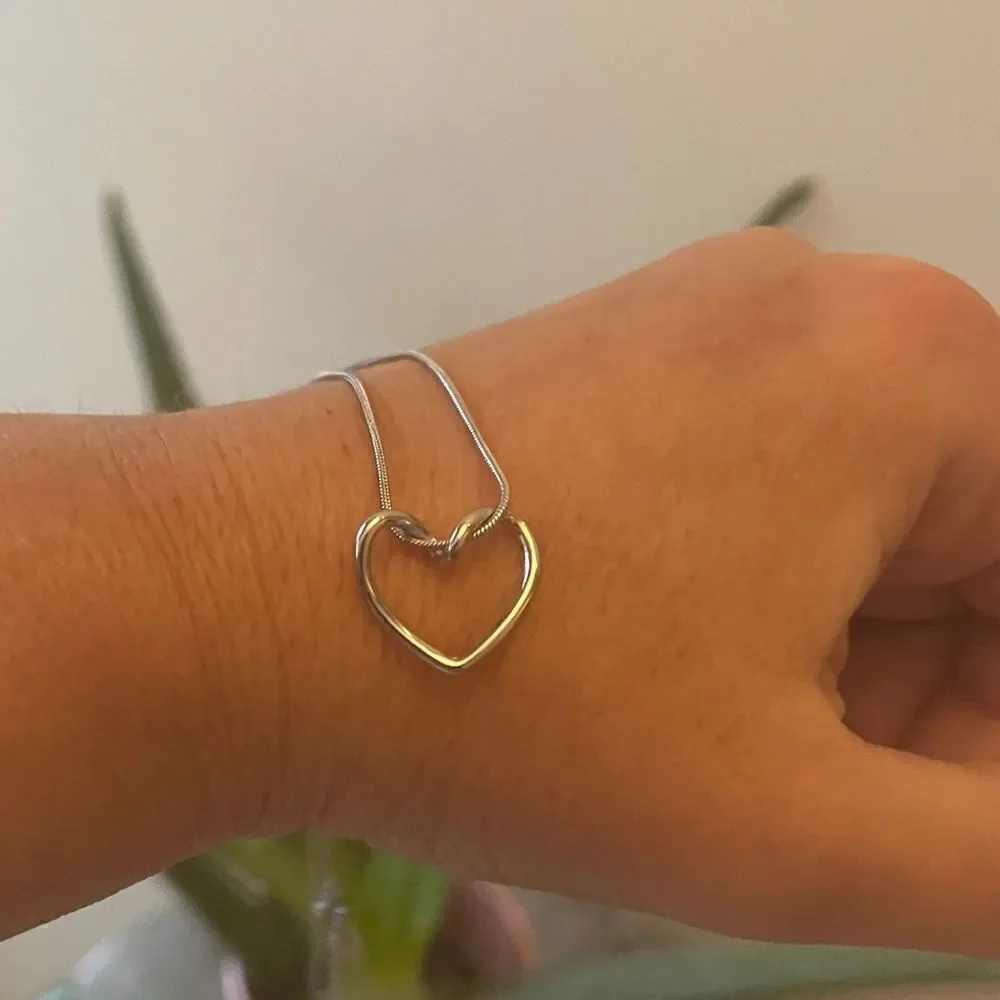 The Simplicity Heart pendant necklace in stainless steel
